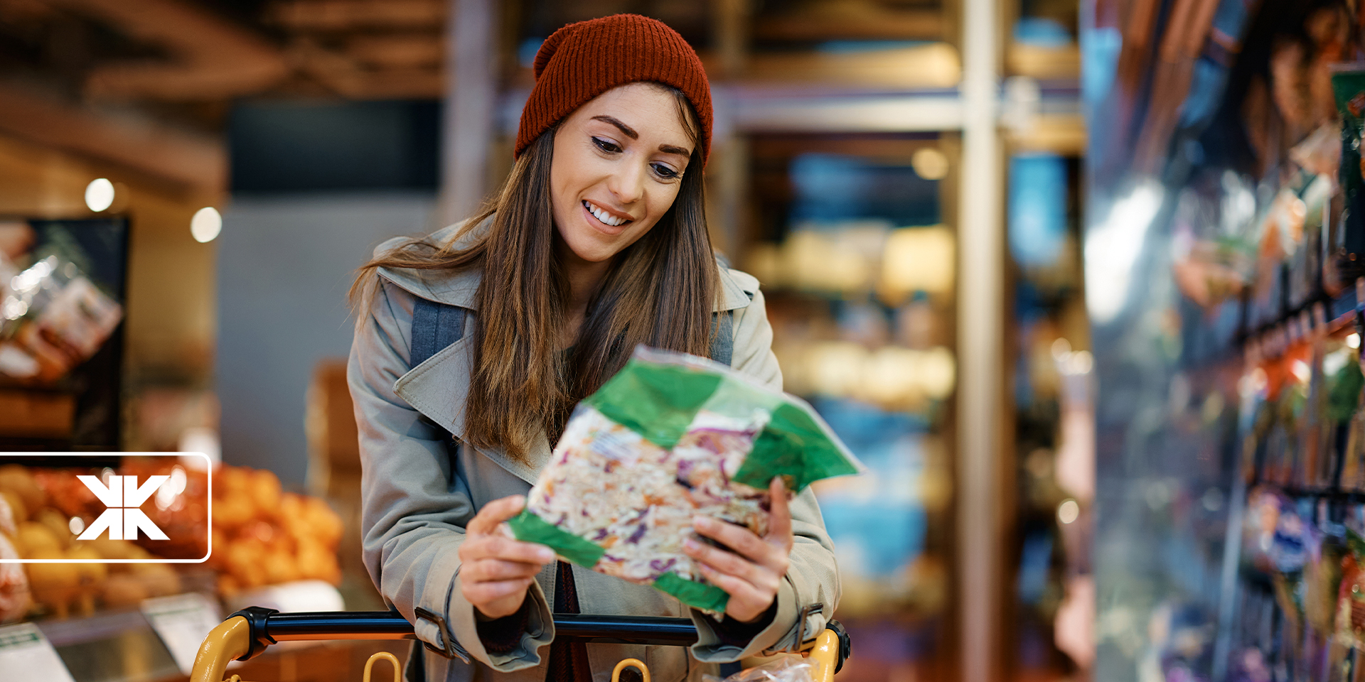 Woman analyzing product packaging in supermarket aisle.